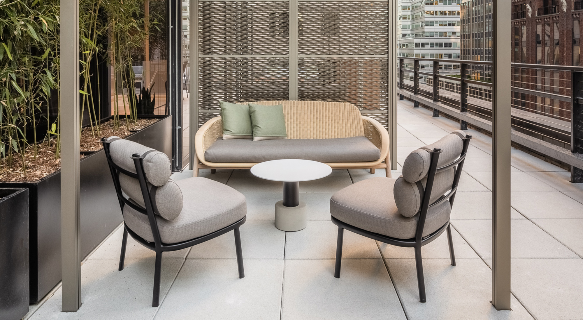 Intimate terrace seating with beige cushions and metal features